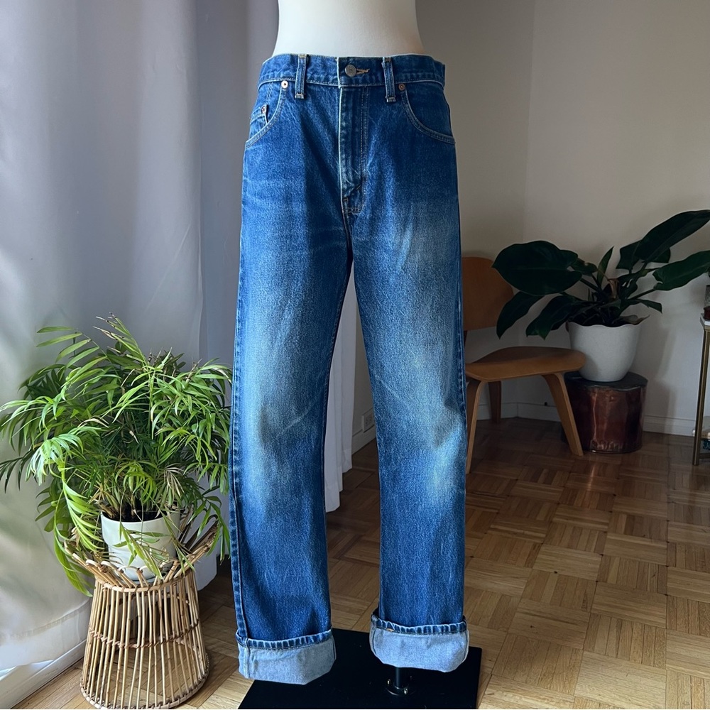 90s Dark Wash Levi’s 505s. Perfectly distressed.